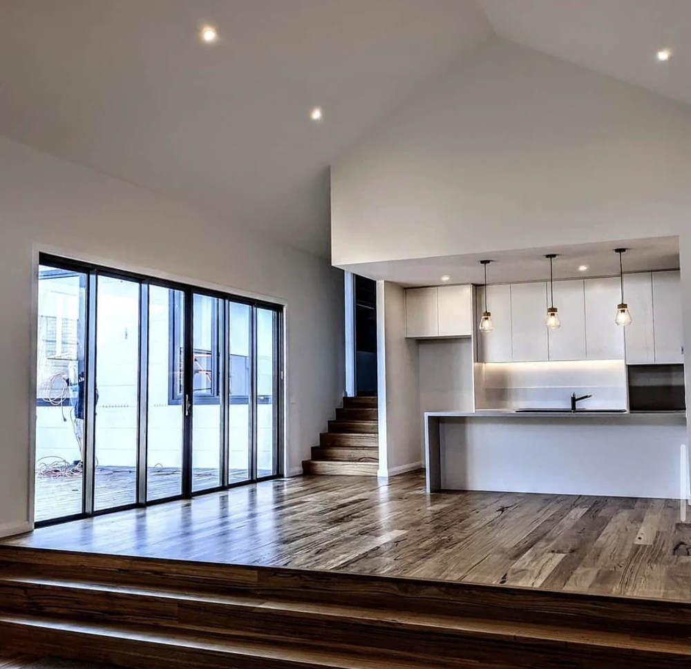 White painted walls and high ceilings in a split-level Highton interior